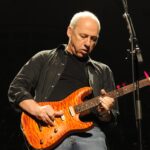 Photo de Mark KNOPFLER — légende du rock sur DiscRock